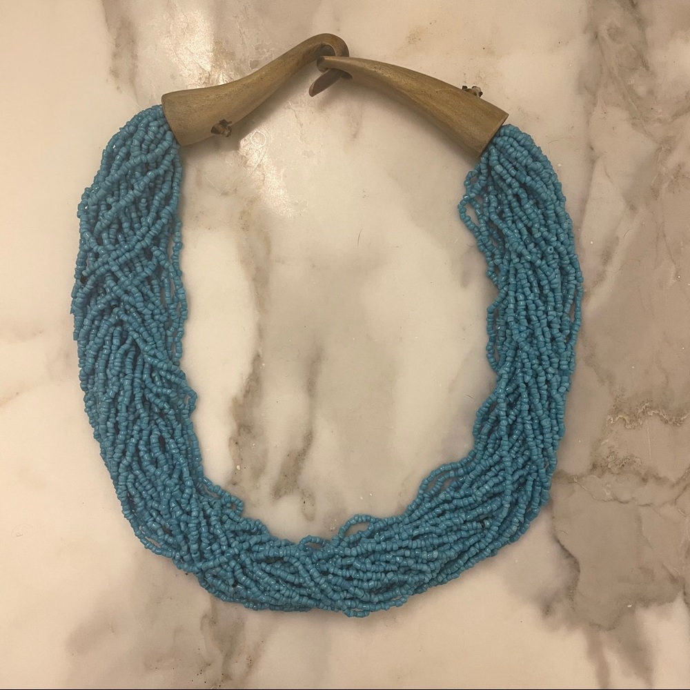 Turquoise beaded necklace with wooden clasp